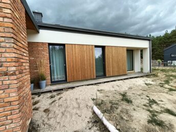 Niwy elewacja deska thermo sosna stara cegła elewacja drewniana HJ Latzke