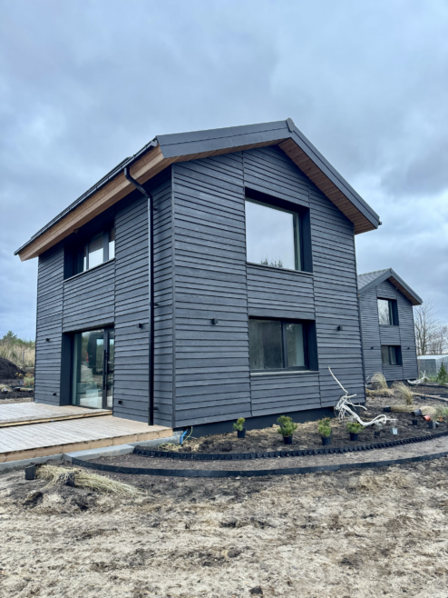 domy elewacja drewniana pozioma tarasy drewniane Latzke