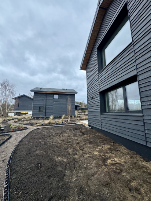 domy elewacja drewniana pozioma tarasy drewniane Latzke