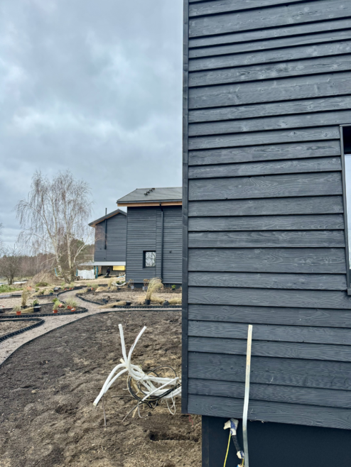 domy elewacja drewniana pozioma tarasy drewniane Latzke