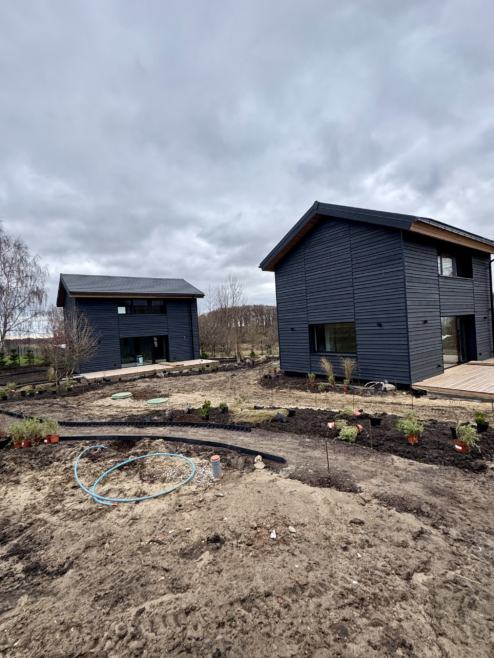 domy elewacja drewniana pozioma tarasy drewniane Latzke