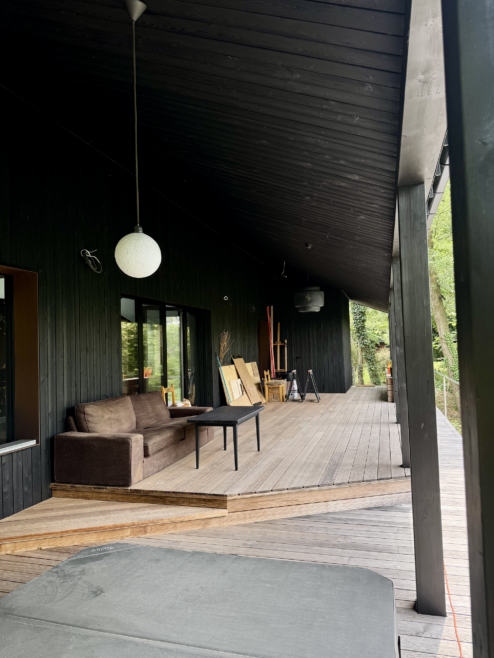 nietypowy dom architekt deska opalana elewacja boazeria zielony dach Latzke Pracownia Stolarska